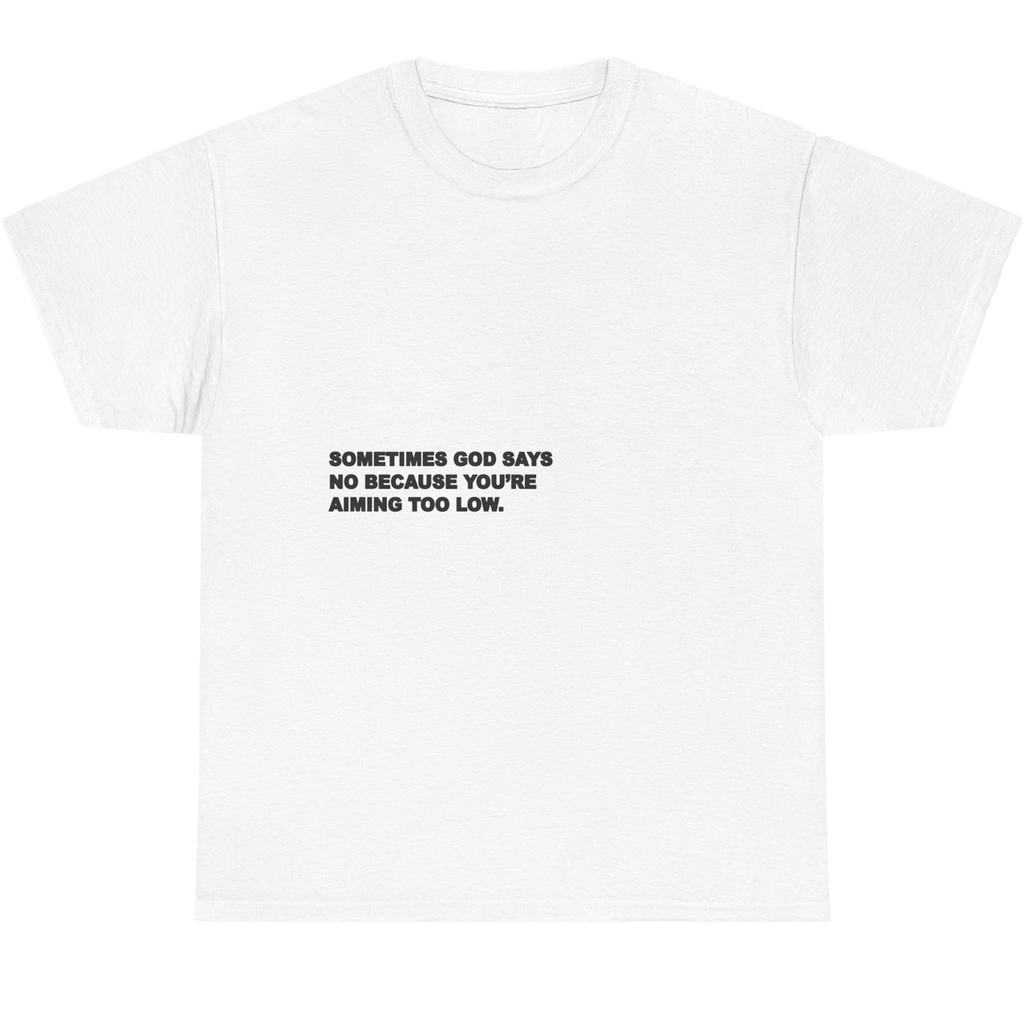 A white short-sleeve crewneck t-shirt with black printed text on the chest that reads 'SOMETIMES GOD SAYS NO BECAUSE YOU'RE AIMING TOO LOW.'.