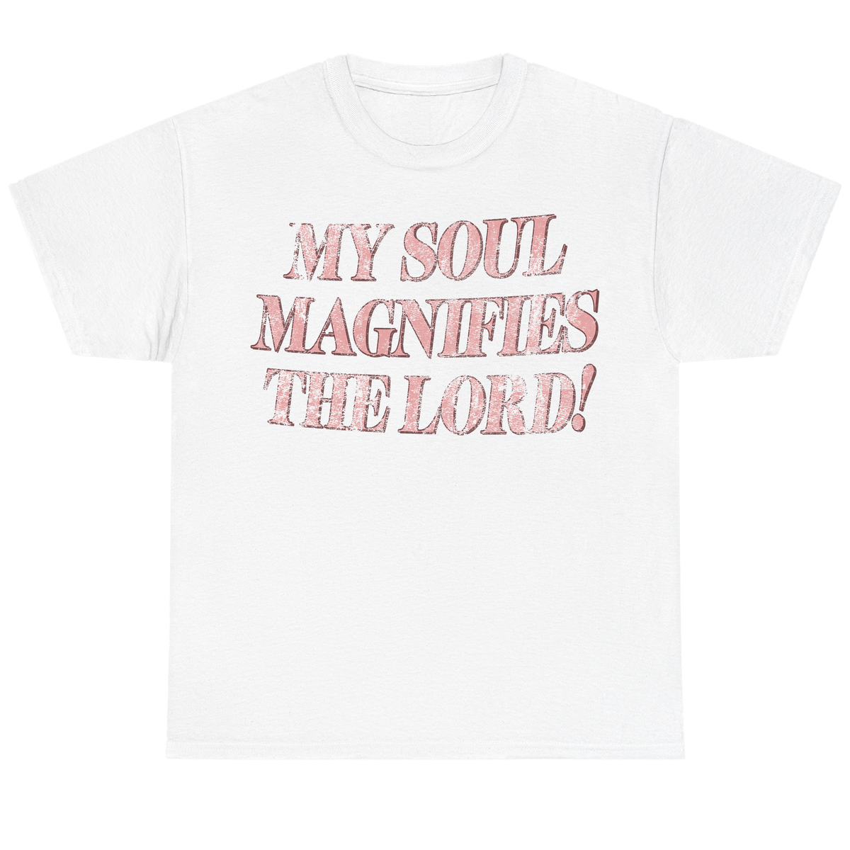 A white short-sleeve crewneck t-shirt featuring the text 'MY SOUL MAGNIFIES THE LORD!' printed on the chest in a textured, distressed pink font.