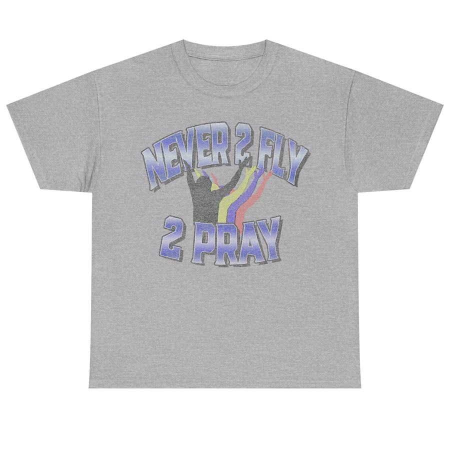 A heather gray short-sleeve t-shirt with a graphic on the front that reads 'NEVER 2 FLY 2 PRAY' in blue-gray lettering with a rainbow stripe and a praying hand silhouette.