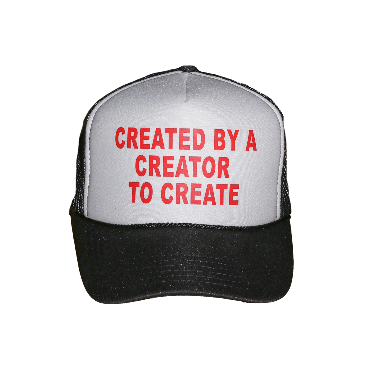 A black and white trucker hat with red text on the front panel that reads 'CREATED BY A CREATOR TO CREATE'.
