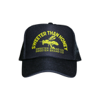 A black trucker-style cap with yellow embroidered text reading 'SWEETER THAN HONEY' and 'SWEETER BRAND CO' around a bee graphic on the front, shown on a plain white background.