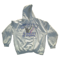 A light gray heather pullover hoodie featuring a front graphic with the text 'NEVER 2 FLY 2 PRAY' in blue and purple outlined lettering, with a black silhouette of a person praying and a small rainbow accent.