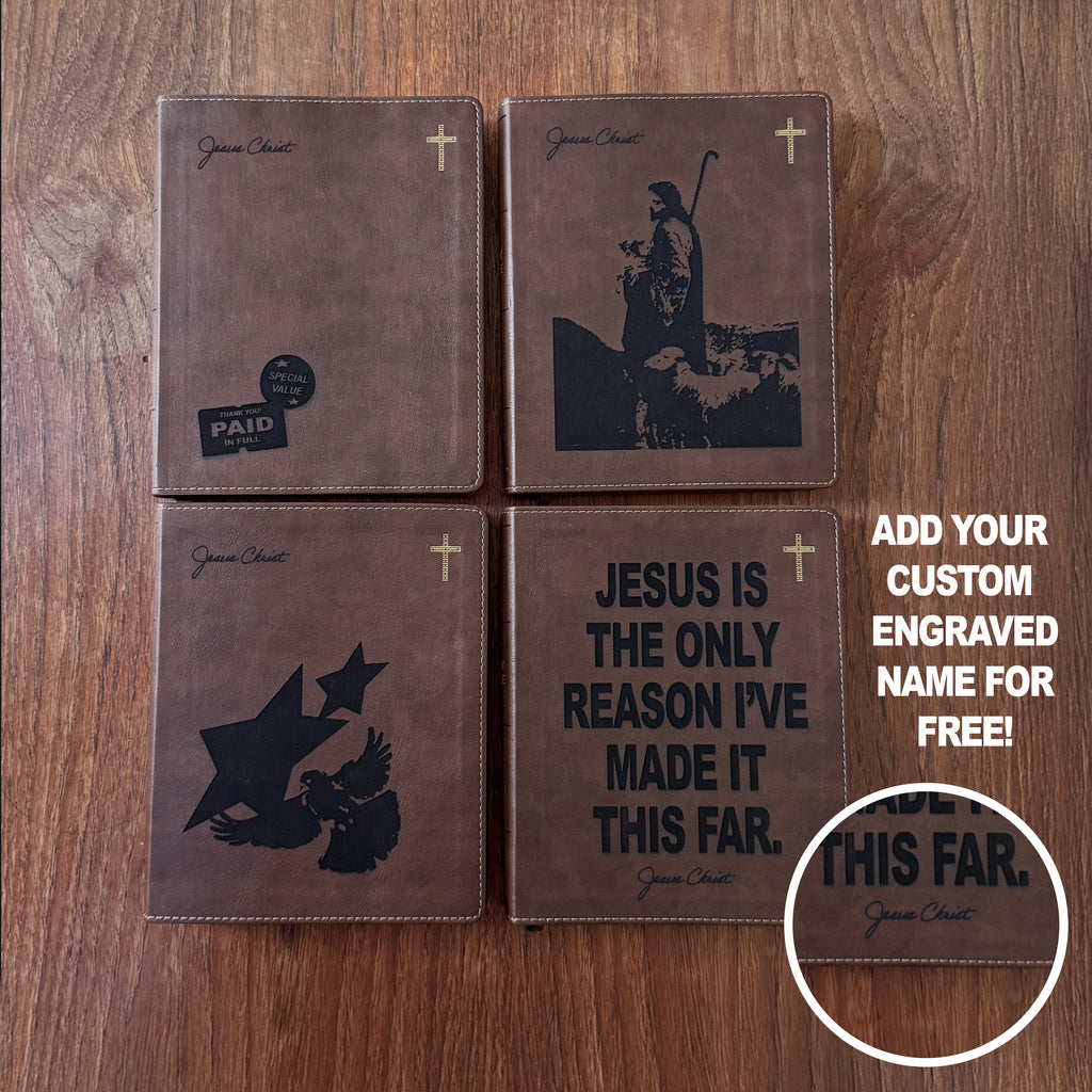 Four brown faux-leather Bible cover bookmarks arranged in a 2x2 grid on a wooden surface. Each cover features a black engraved design, including a cross, a saint, a dove and star, and a motivational scripture quote.