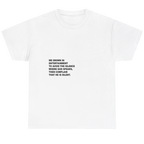 A white short-sleeve crewneck t-shirt with a black printed text quote on the center chest, displayed flat against a white background.